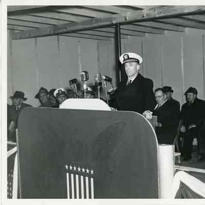 Man giving talk at Army Navy E award ceremony at Sturgeon Bay Shipbuilding and Drydock Company April 20, 1944