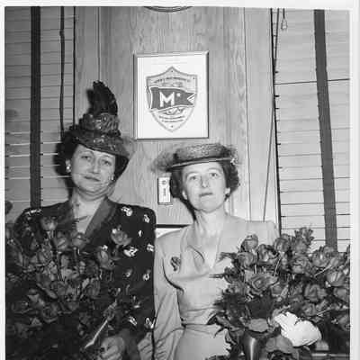 Two women at chstening of YW-126 Tulare