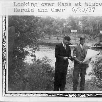 Harld Van Bramer and Omer Goserud looking over maps, 6/20/1937