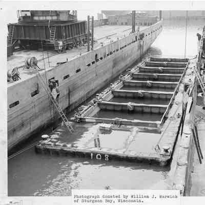 Barge 108 docked at Christy Corp November 12, 1961