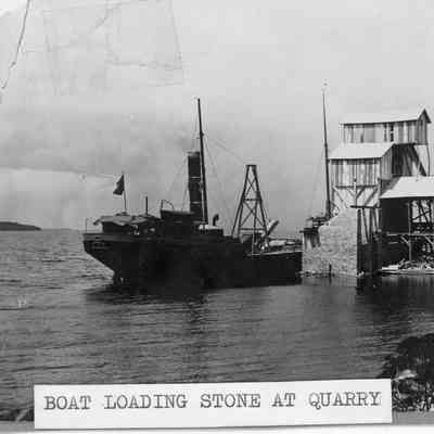 Boat loading stone at stone quarry