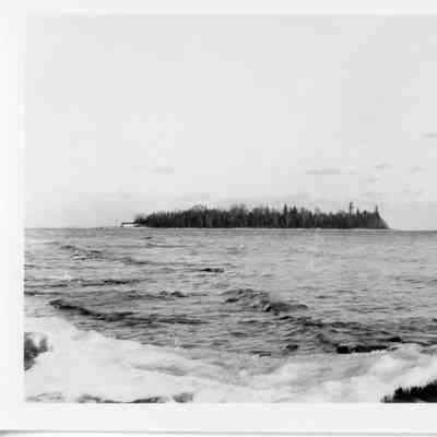 Cana Island with freighter on right