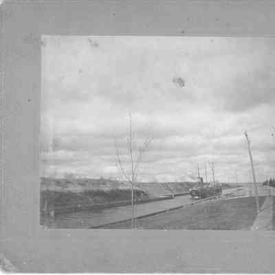 unidentified vessel going through canal