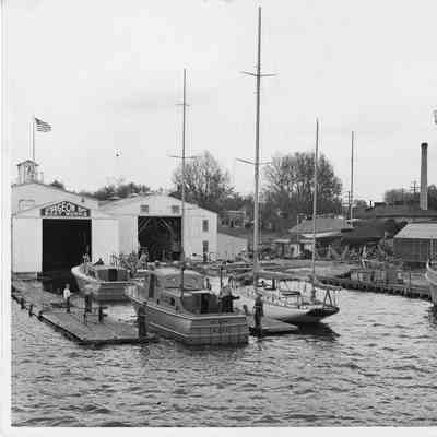 US Army P-296 with 3 men docked at Sturgeon Bay Boat Works 1943