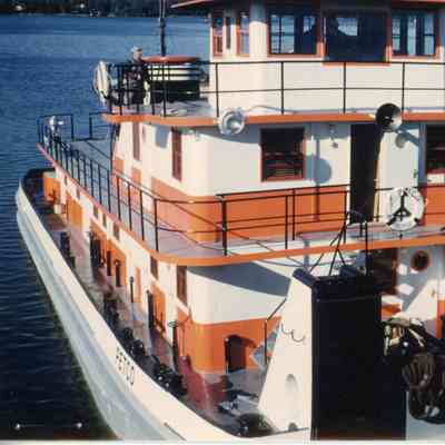 Orange and white vessel PETCO docked