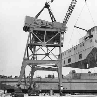 Pilot house suspended above vessel by PBI gantry crane