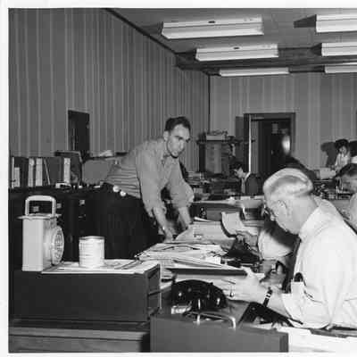 Men working at Leathem D. Smith Shipbulding co. Offices