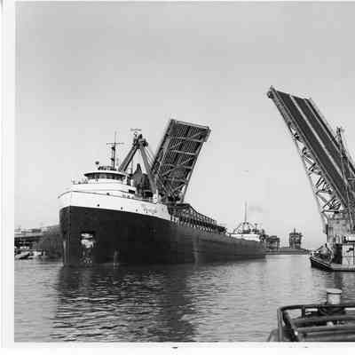 W.W. Holloway going through unidentified bridge