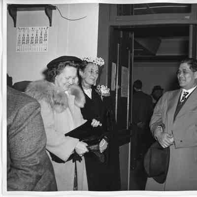 Alva Smith along with unidentified people