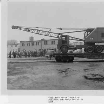 Completed crane loaded on railroad car ready for shipment