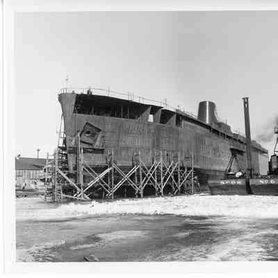 Spartan under construction next to Scow No.6 March 10, 1952