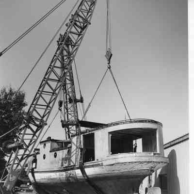 Hope on crane being place at Door County Maritime Museum Gills Rock 1992