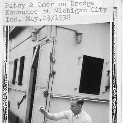 Omer and dog, Patsy, on dredge Kewaunee 5/29/1938