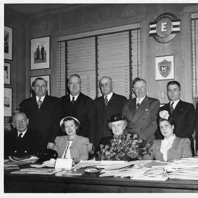 Ten people at christening of PC-1180