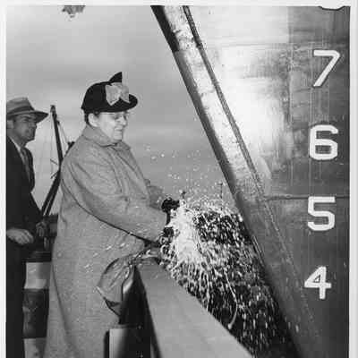 Mrs. Theodore E. Lyman christening the AN-88 Shakamaton