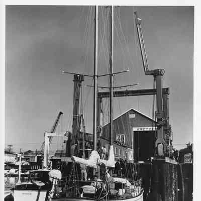Sailboat in water underneath Travelift