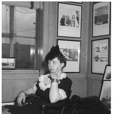 Sponsor sitting in office at L.D. Smith shipbuilding Co.