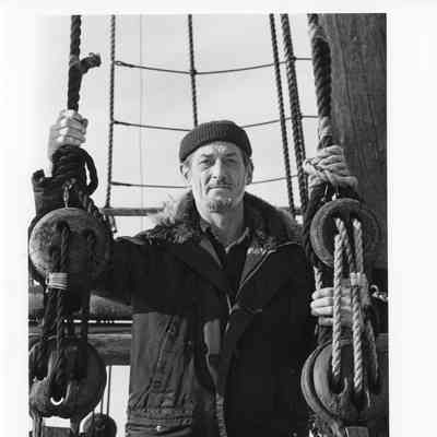 Portrait of Frank Hoffman on deck of the Alvin Clark