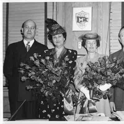 Four people at christening of YW-126 Tulare