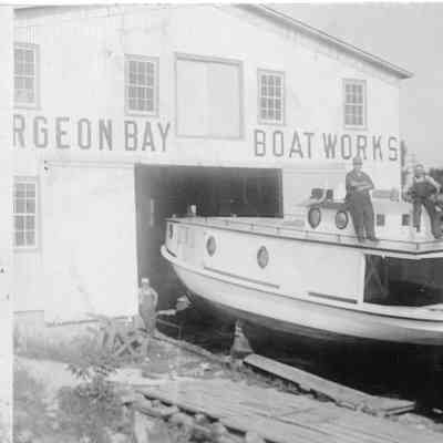 Fishing tug Ranger in cradle in front of Sturgeon Bay Boat Works