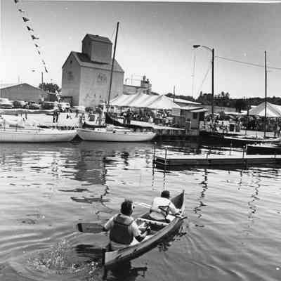 2 men in a canoe during Maritime Festival 1993