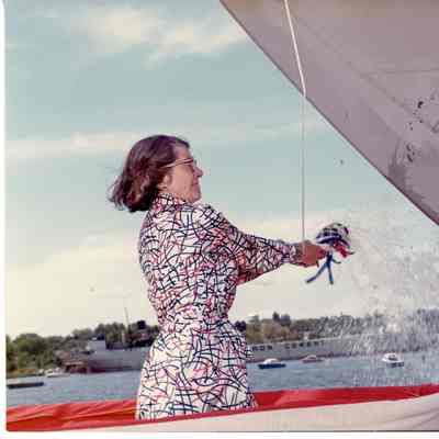 Woman christening PBI ship Oceanus