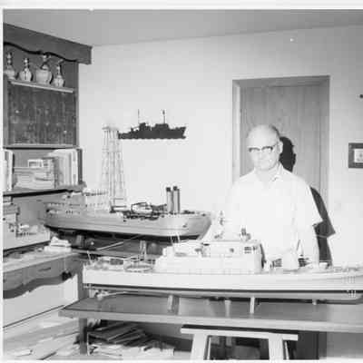 Bill Herbst with model ships he built 1997