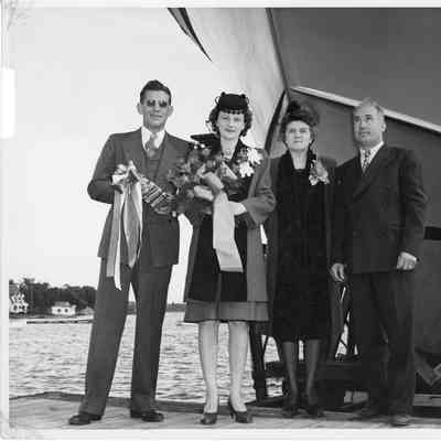 Arthur and Lucille Gast and with Mr. and Mrs. Fred Peterson prior to ship launching