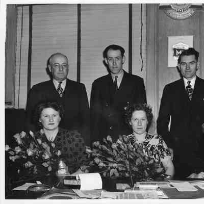 Six people at christening including Leathem D. Smith, Lorrayne Cunningham, Mrs. Edward Necklewitz, and Mrs. Lester Schroeder