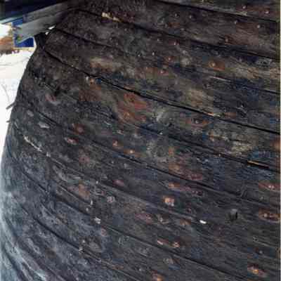 Alvin Clark planking on port side of bow looking aft 1994