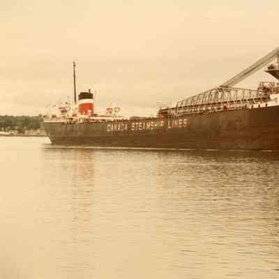 Self-unloader Stadacona underway in Saint Mary's River June 1982