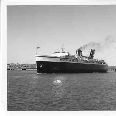 Spartan passing through Michigan street bridge September 27, 1952