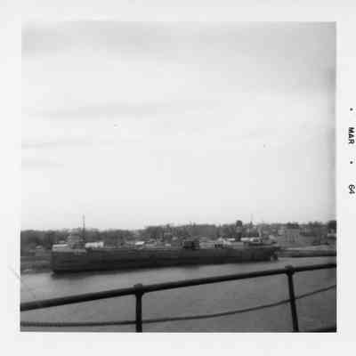 Docked vessel with star on smokestack March 1964