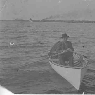 Joseph Harris Jr. in double ended rowing boat
