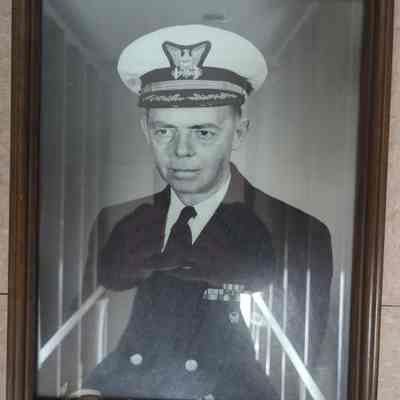 Framed photograph of Captain Gene Gislason