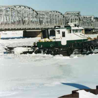 Sharon M. Selvick docked next to Michigan Street Bridge