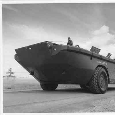 Man sitting inside US Army Larc 49