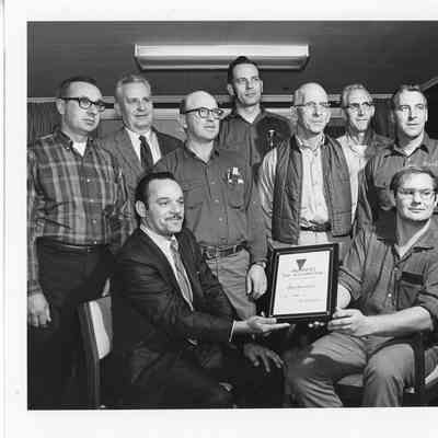 Group photo of Palmer Johnson employees receiving award of excellence 1970