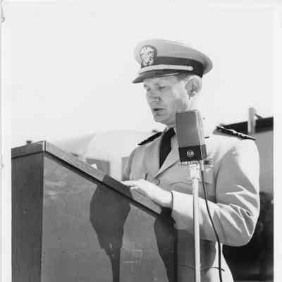 Man speaking at christening of LST-1166, September 9, 1953