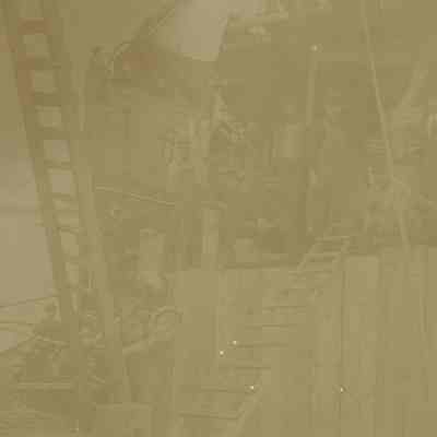 Diver in bell helmet about to enter water