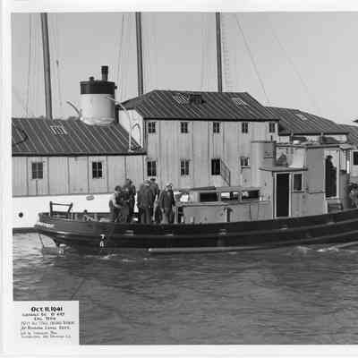 50' all-steel welded tender W-697 in water outside of Sturgeon Bay Shipbuilding and Drydock Company