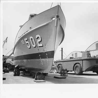 PBI Navy Ship M502 on blocks and Larc LX60 alongside