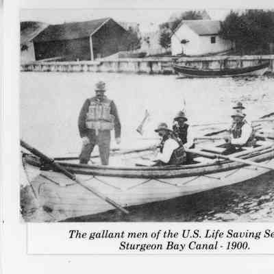 USLSS sailors on boat at Sturgeon Bay Canal