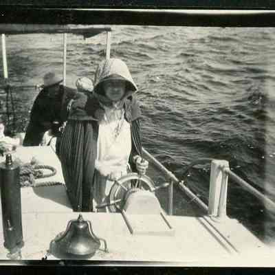 Marie at the wheel of the Oweenee 1923