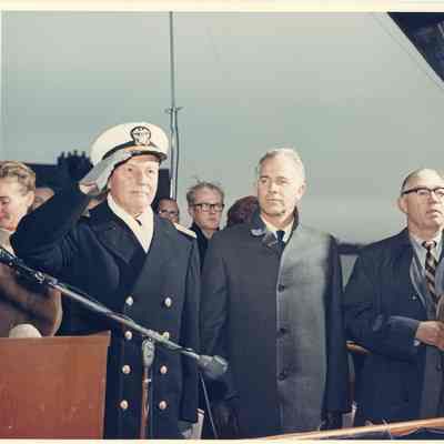 Group of people standing at the Alcoa Seaprobe christening podium