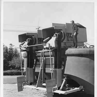Stern view of PBI Larc with man standing on stern
