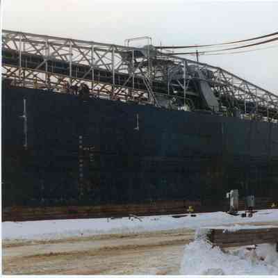 side view of freighter docked at Bay Ship duiring Winter