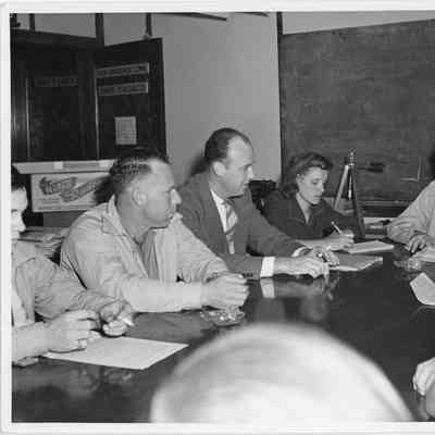 Group of people at table in Labor-Management Communication training headquarters