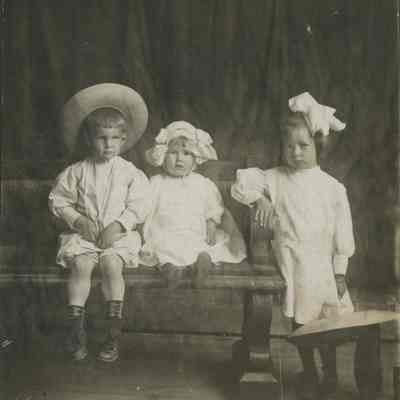 Portrait of three young children