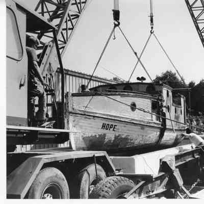 Hope in hoist being placed at Door County Maritime Museum Gills Rock 1992